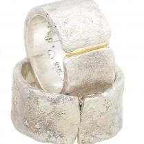 Rough forged silverrings with gold-filled seam